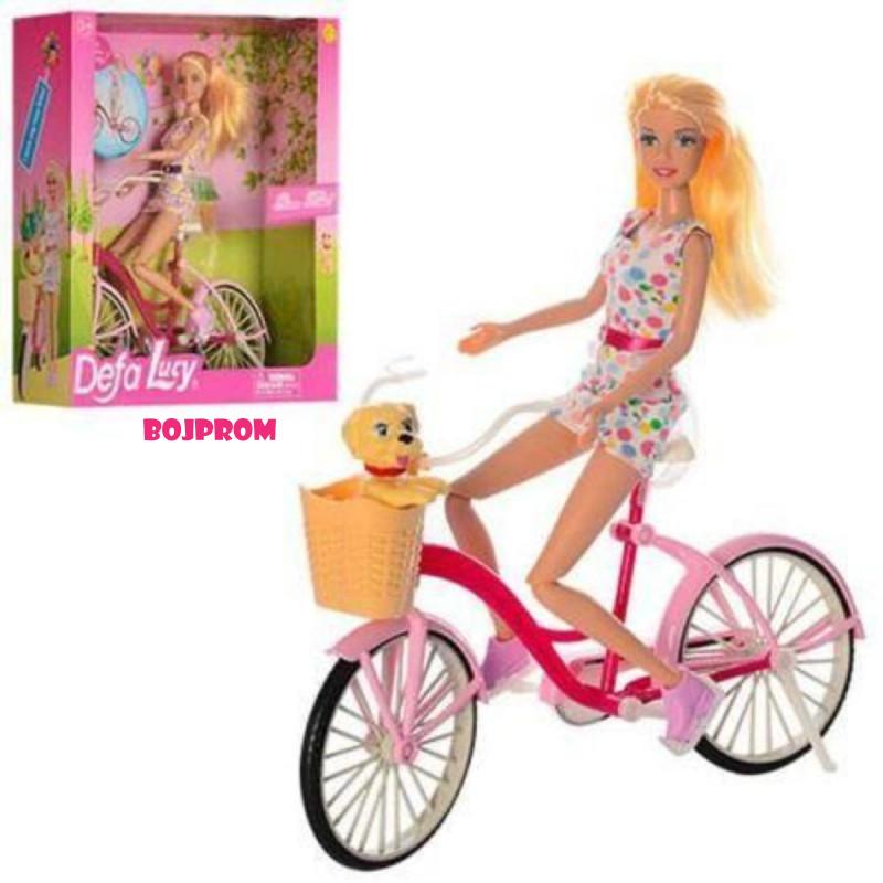 DEFA LUTKA NA BICIKLU SA LJUBIMCEM 